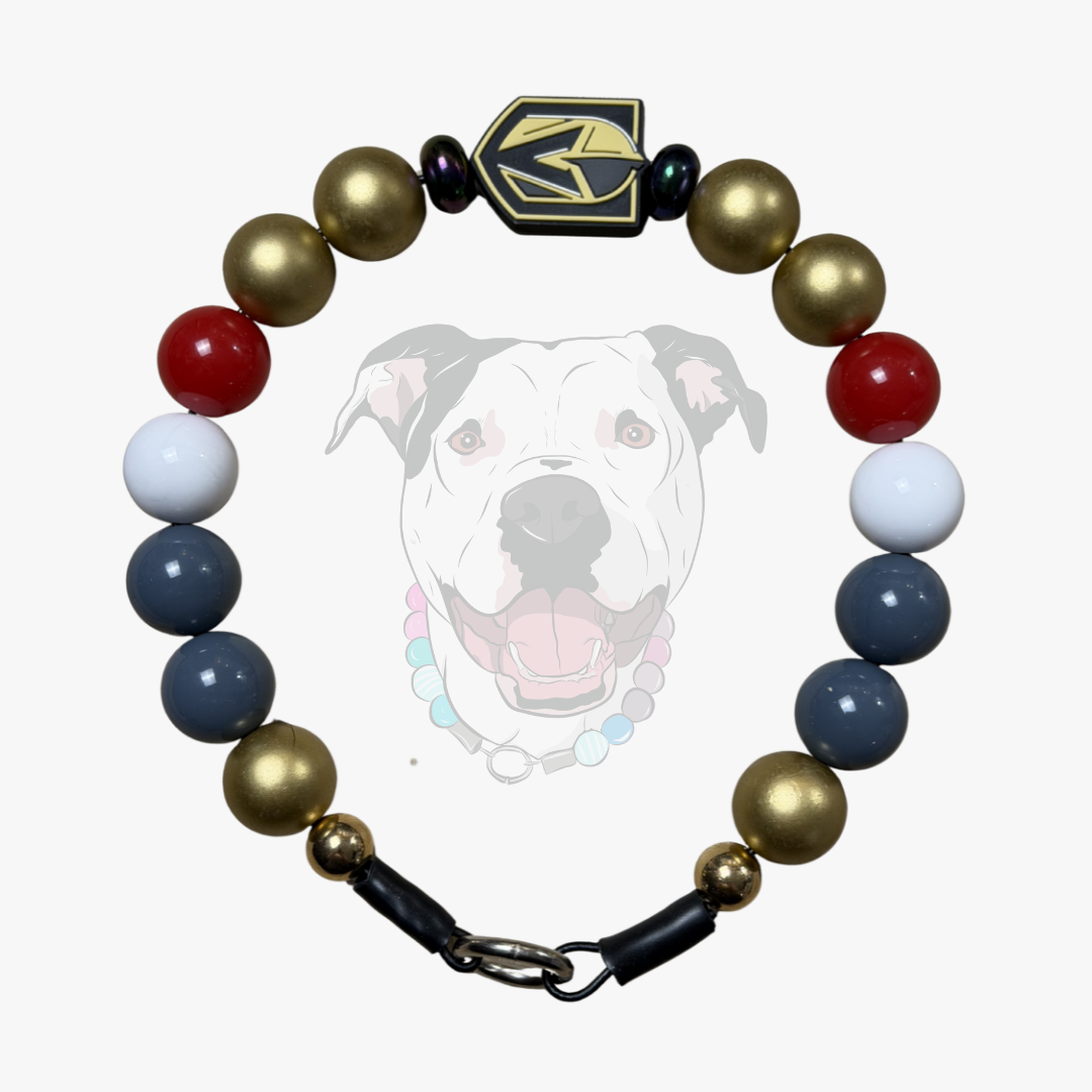NHL Golden Knights Team Colors Game Day Grey, Gold, red and White beaded Pet collar on aircraft grade stainless steel wire laying flat on a white surface.