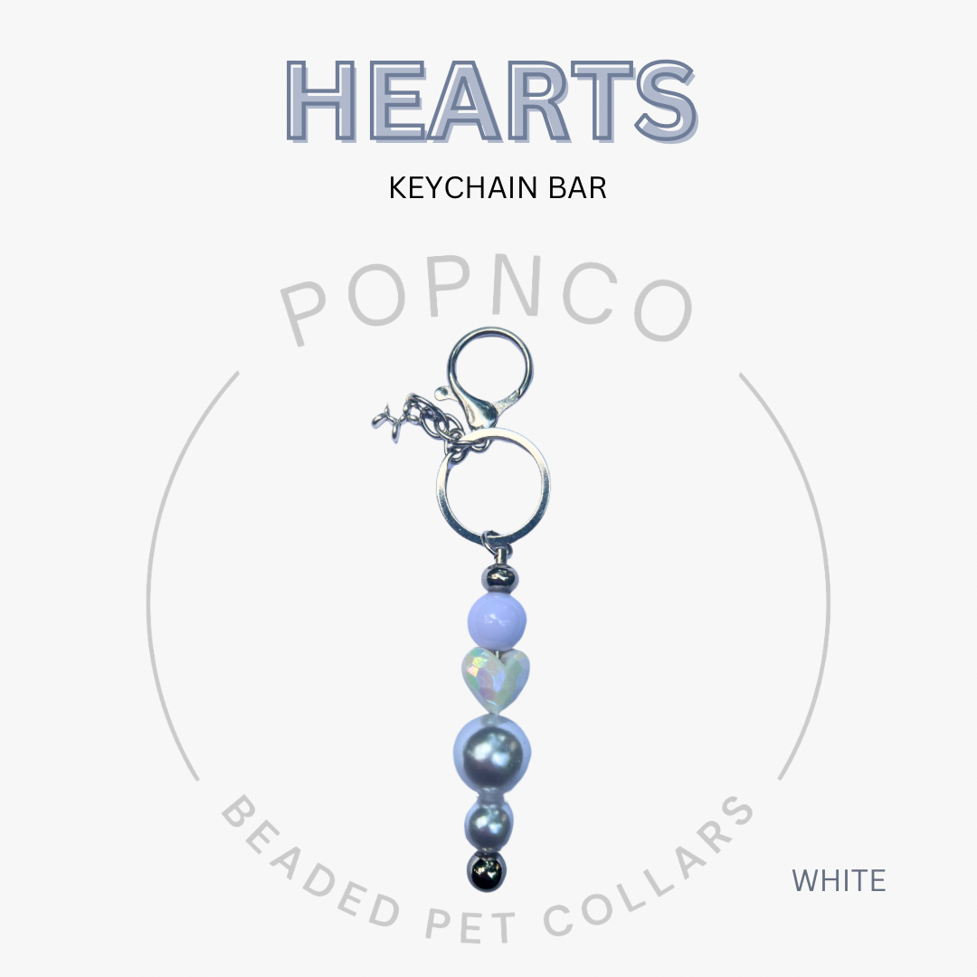 Keychain bar with heart-shaped beads on a white background, featuring the brand 'POPNCO'.