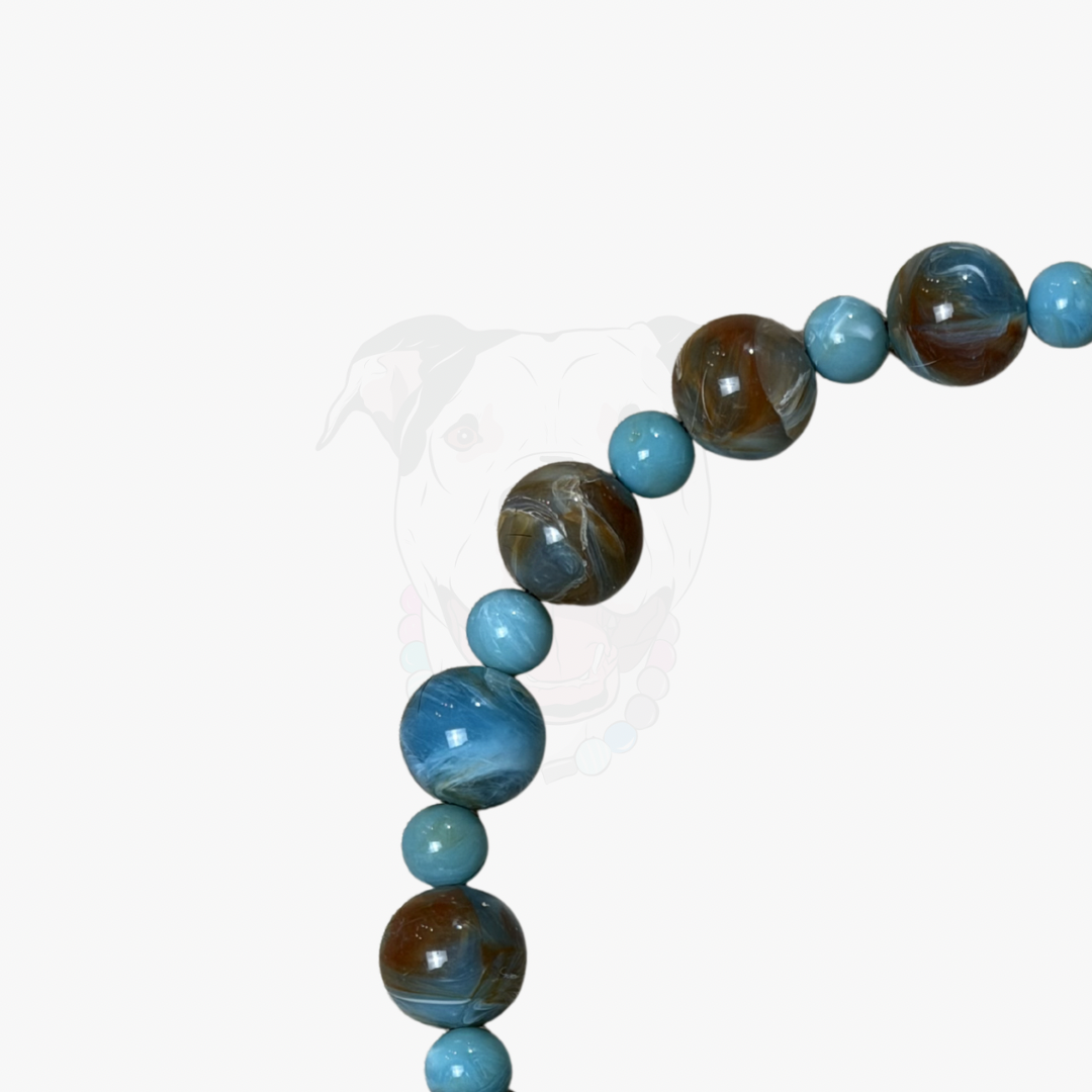 Beaded Collar with blue and brown beads on a white background