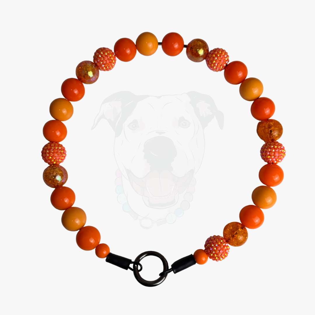 Beaded bracelet with orange and yellow beads on a white background POPNCO acrylic bead, Bead dog collar, beaded collar, Beaded dog collar, Breathable dog collar, cat collar, Comfortable Dog Collar, dog collar, Durable dog collar, Easy to clean dog collar, Easy to clean dog collars, fashion collar, Pet accessories, pet collar, popnco, Popnco dog collar, slip on collar, Slip on dog collar, Stylish dog collar