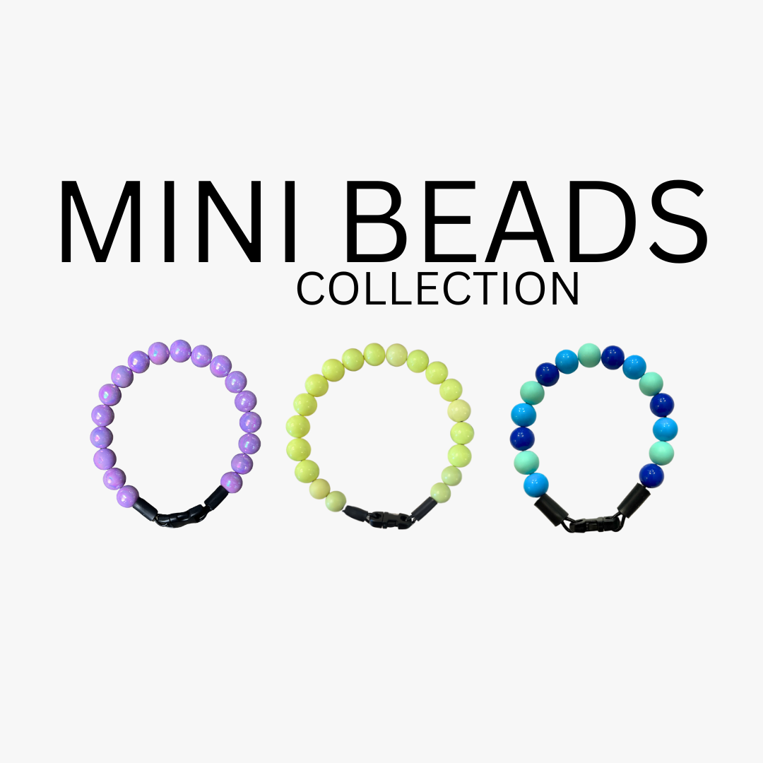 Three mini bead bracelets in purple, green, and blue with black elastic bands on a white background.