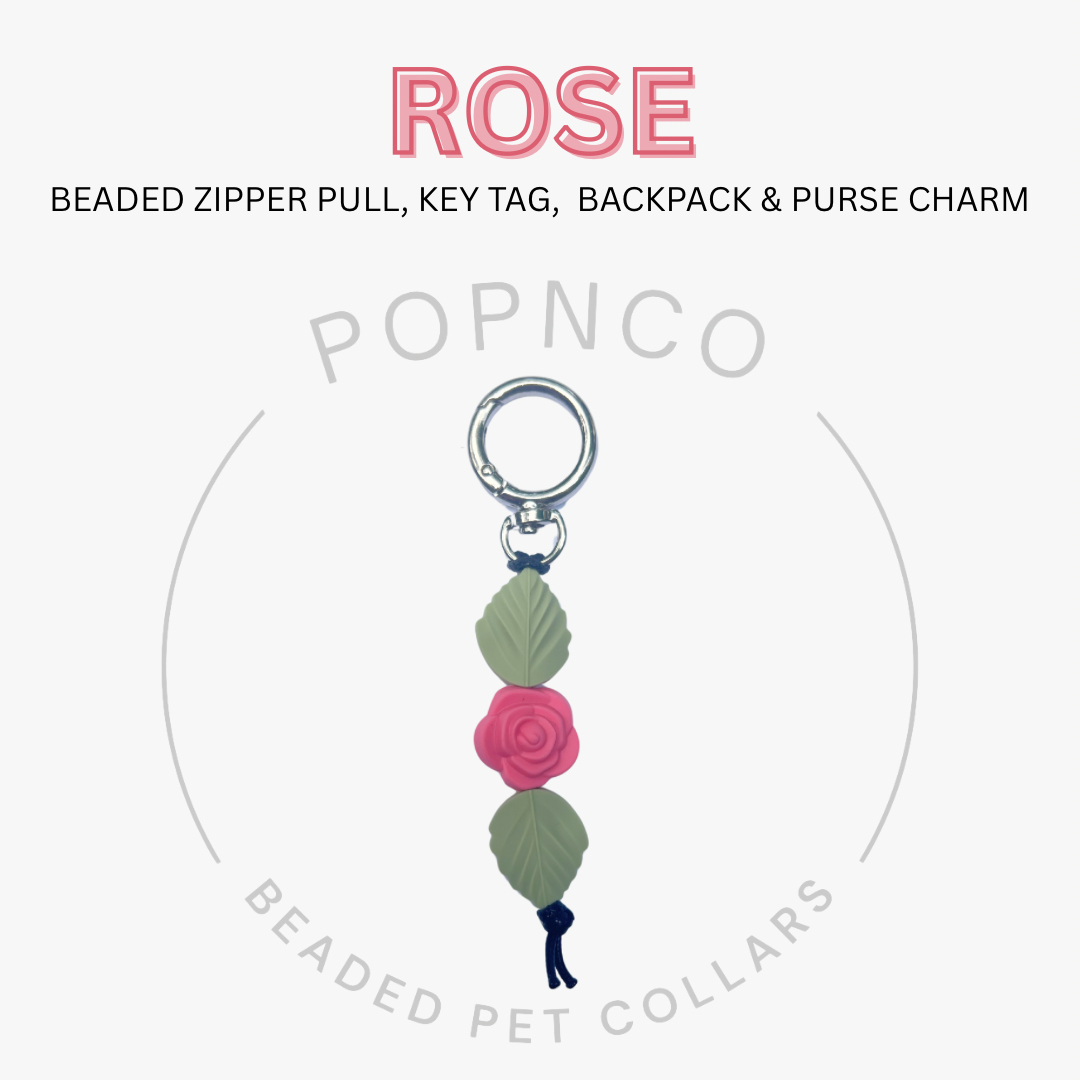 Rose beaded zipper pull, key tag, backpack & purse charm with Popnco branding on a white background.