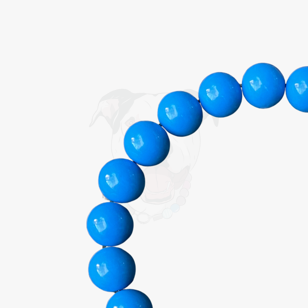 Close up of 12mm smooth lake blue mini acrylic beads on the Juniper Mini slip on dog collar by POPNCO
