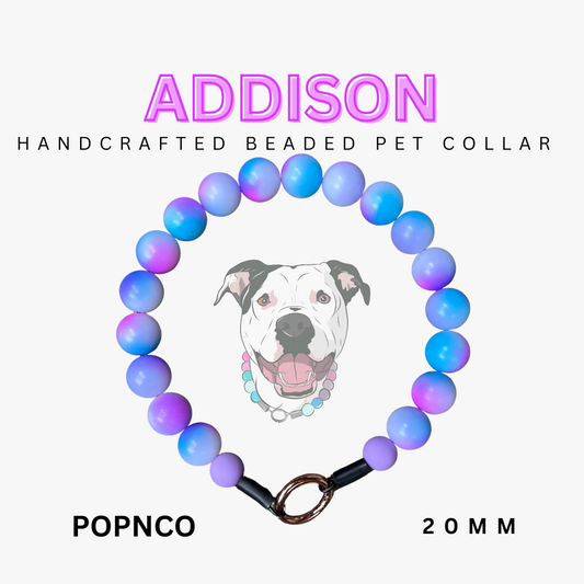Handcrafted beaded pet collar with 'ADDISON' branding on a white background