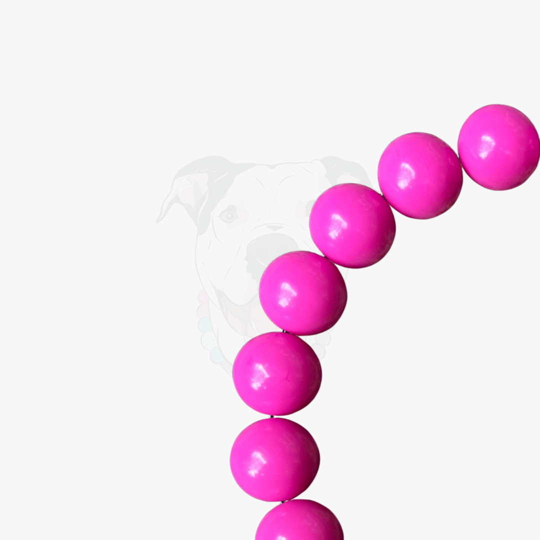 Pink beads on a white background
