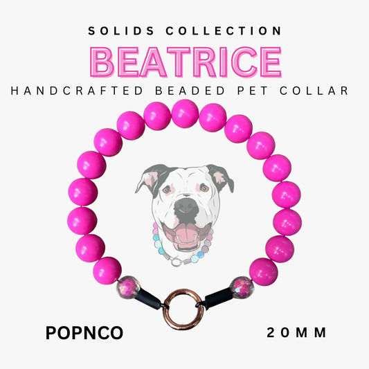 Handcrafted beaded pet collar with pink beads and a dog illustration on a white background