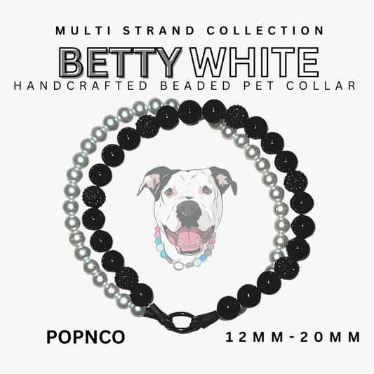 Handcrafted beaded pet collar with black, white, and gray beads on a white background, featuring the brand 'Betty White'.