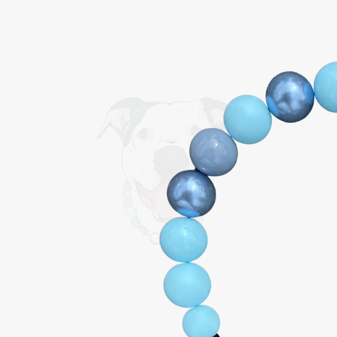 Blue and light blue beaded bracelet on a white background