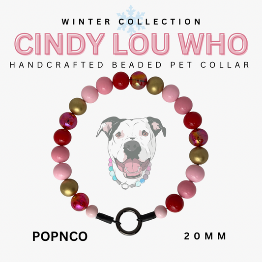 Handcrafted beaded pet collar with colorful beads and a dog illustration, branded 'Cindy Lou Who'.