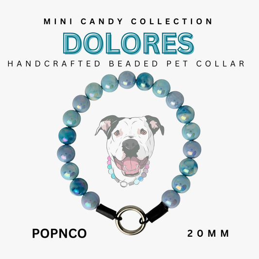 Handcrafted beaded pet collar with a dog illustration, labeled 'Dolores' from the Mini Candy Collection. POPNCO Acrylic Beads, beaded collar, Beaded dog collar, beaded necklace, Breathable dog collar, cat collar, Cat necklace, Comfortable Dog Collar, dog collar, dog Necklace, Durable dog collar, Easy to clean dog collar, fashion collar, handmade, Pet accessories, pet collar, pet necklace, Popnco dog collar, slip on collar, Slip on dog collar