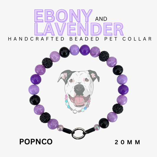 Handcrafted beaded pet collar with purple and black beads, featuring a dog illustration and brand name 'Ebony and Lavender'.