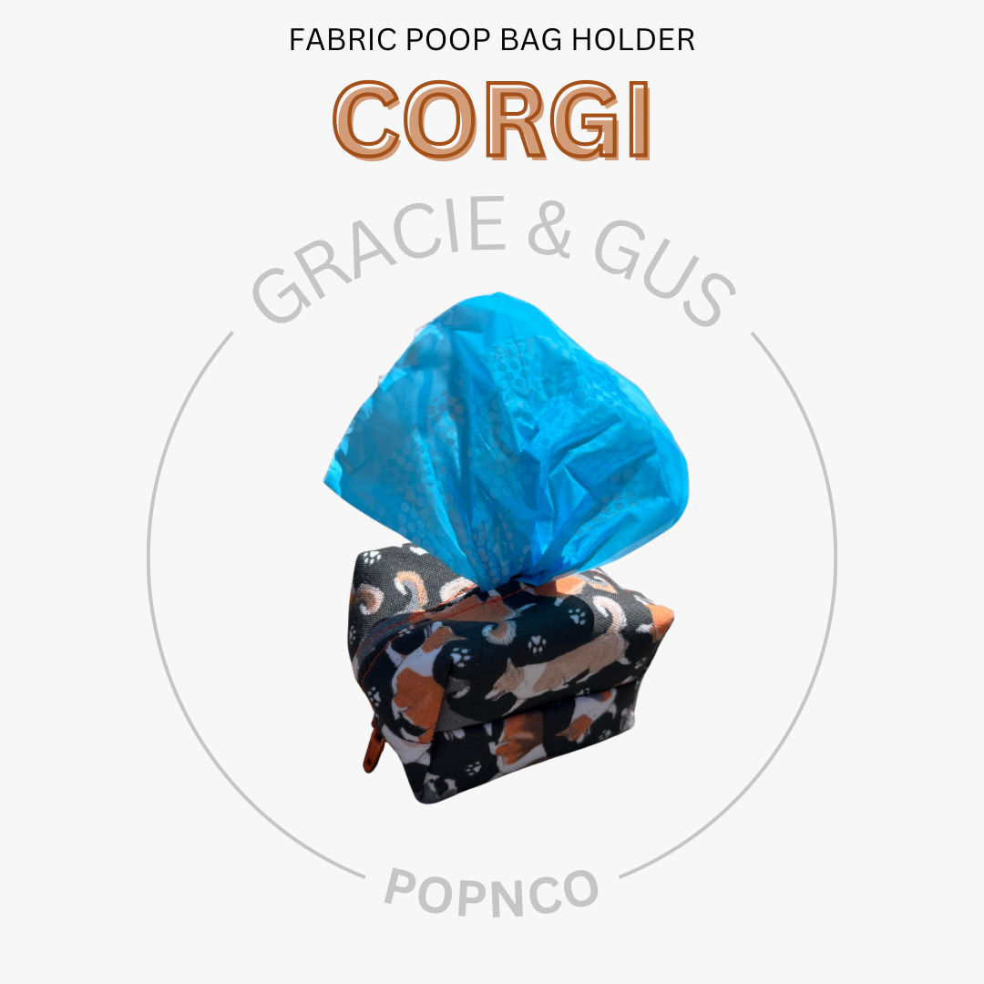 Fabric poop bag holder with blue bag labeled 'Corgi' by Gracie & Gus on a white background.