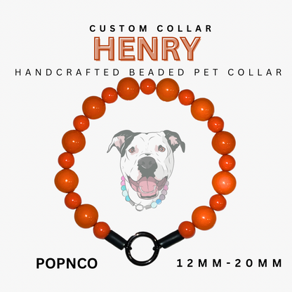Handcrafted beaded pet collar with orange beads and black clasp, featuring a dog illustration and brand name.