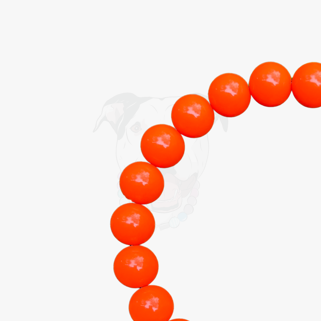 Orange beaded bracelet on a white background