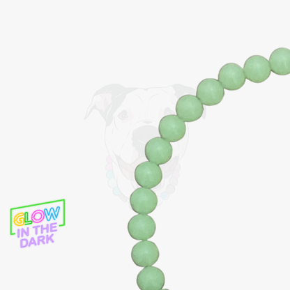 Close up of the iluma Green glow in the dark 12mm beaded collar with a clasp on a white background