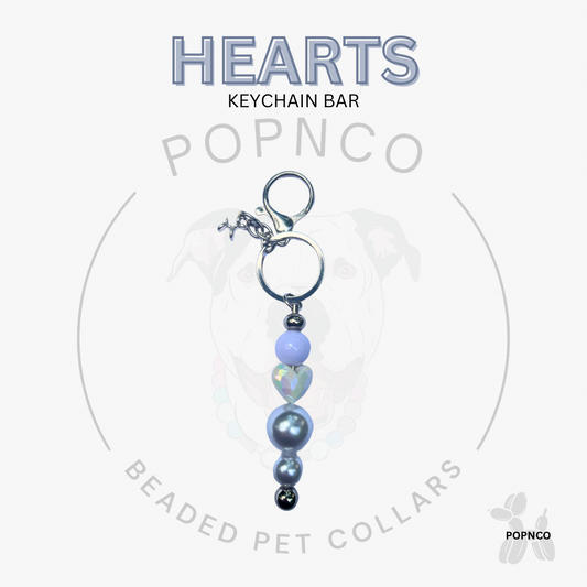 Beaded keychain bar with heart-shaped beads on a white background, featuring the brand 'POPNCO'.