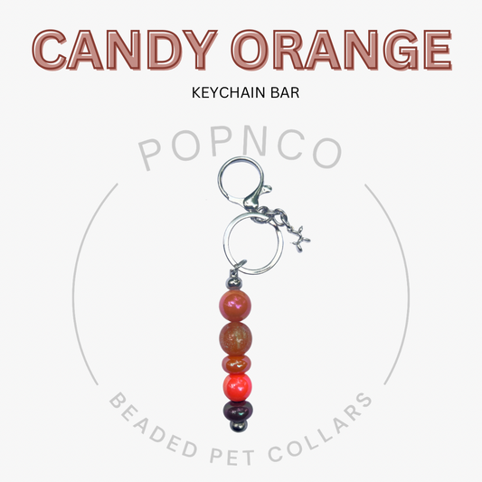 Keychain bar with beads on a white background, featuring the brand 'Candy Orange' and 'POPNCO'.