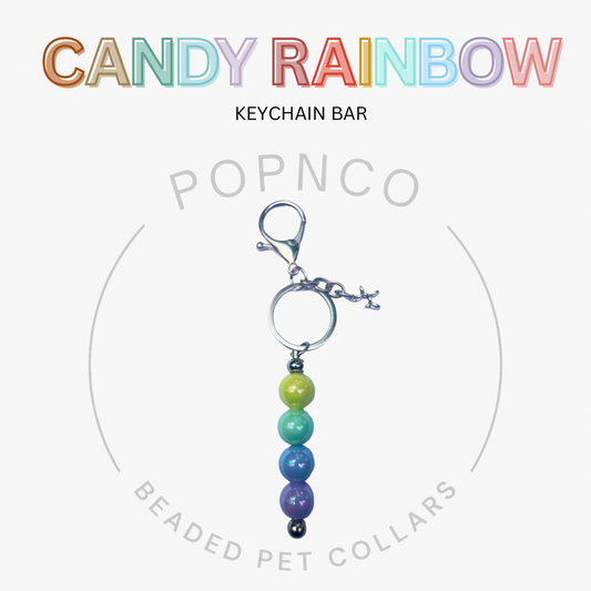 Candy rainbow keychain bar with colorful beads on a white background, featuring Popnco branding.
