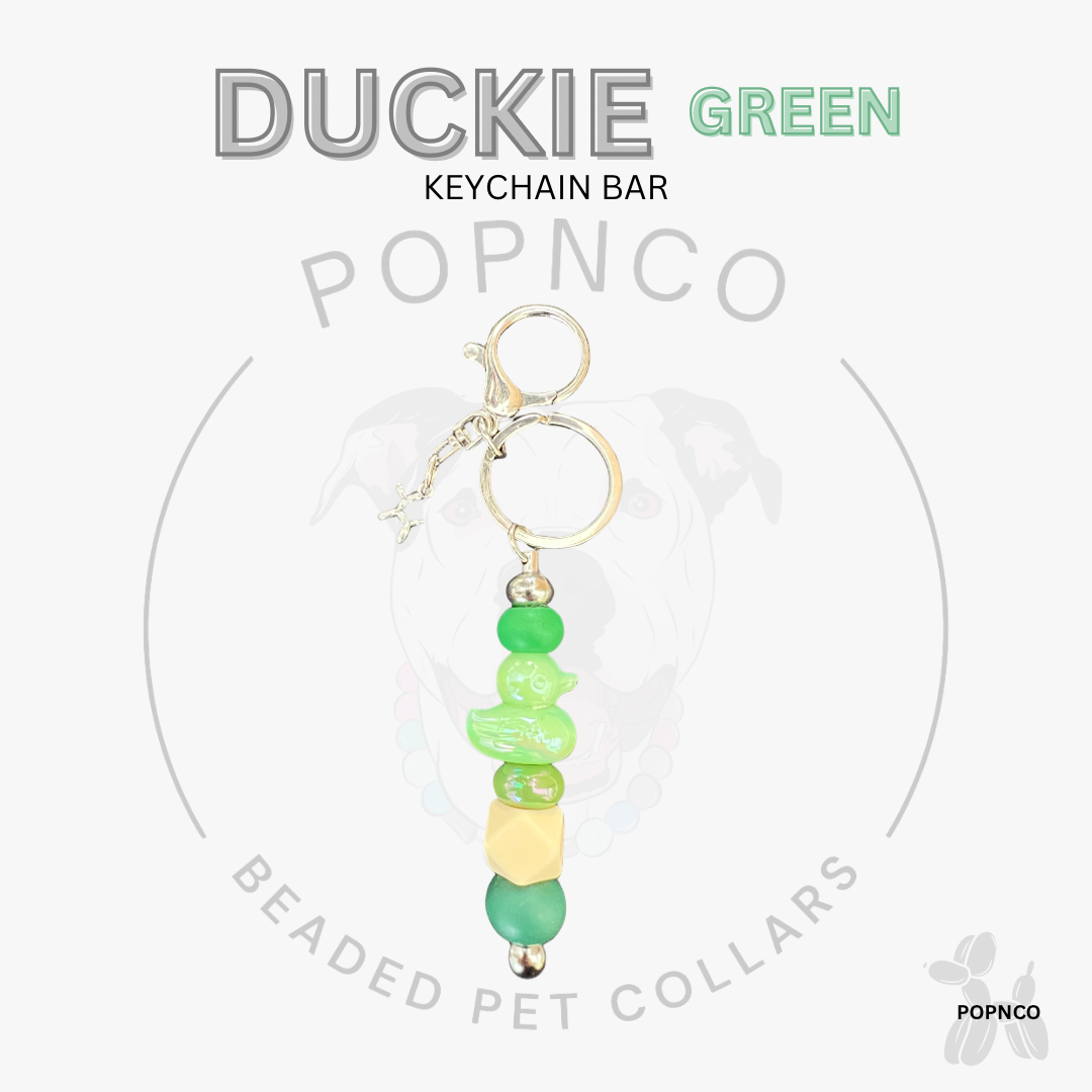 Green beaded keychain bar with 'Duckie Green' text on a white background
