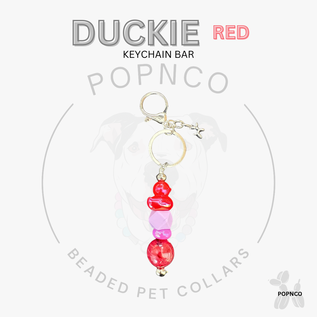 Keychain bar with red and pink beads on a white background, featuring the brand 'Popnco'.