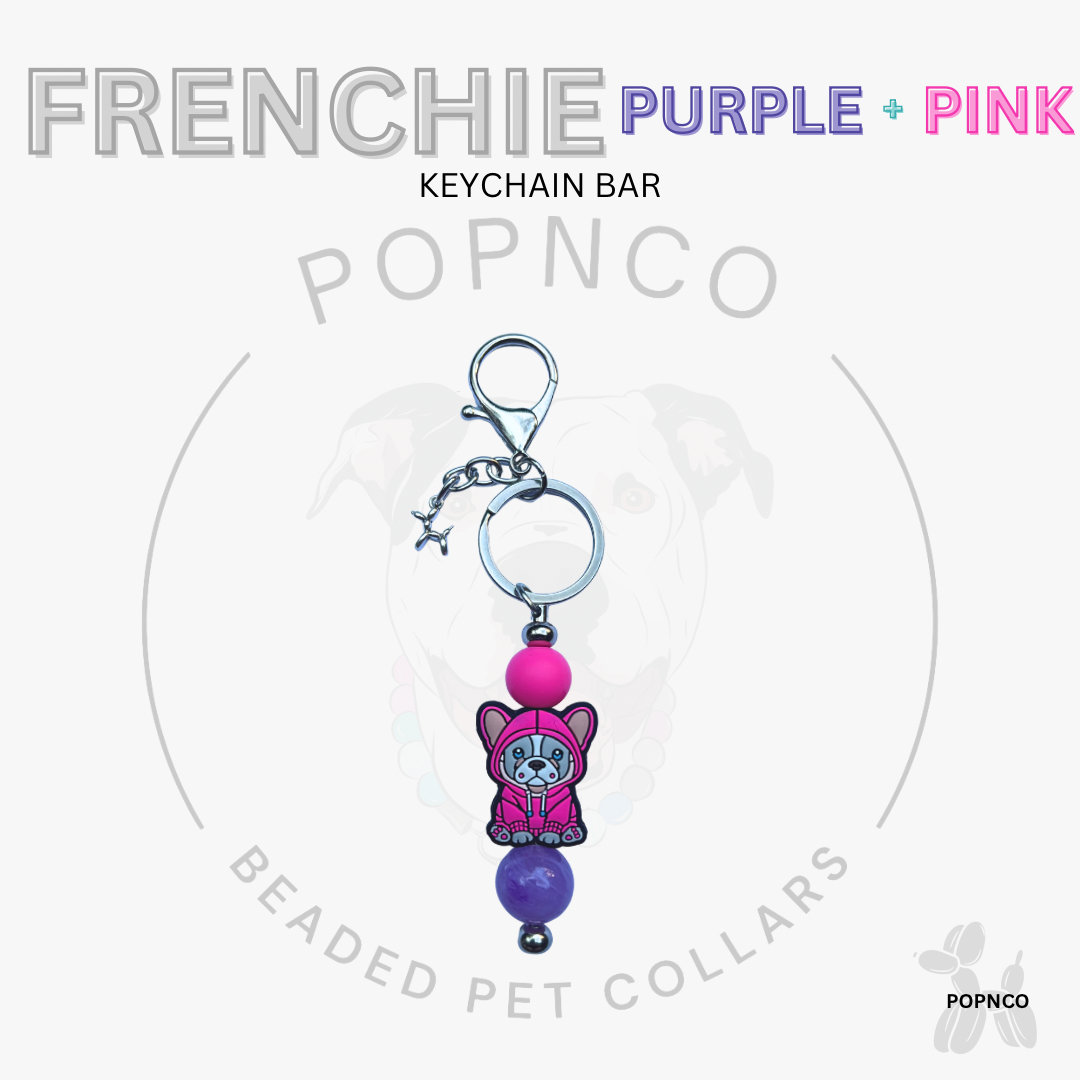 Keychain bar with purple and pink beads featuring a cat design on a white background, branded as FRENCHIE by POPNCO.