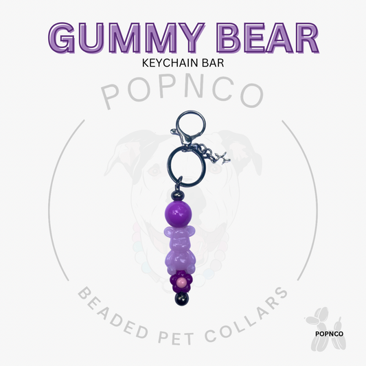 Purple beaded keychain bar with 'Gummy Bear' text on a white background