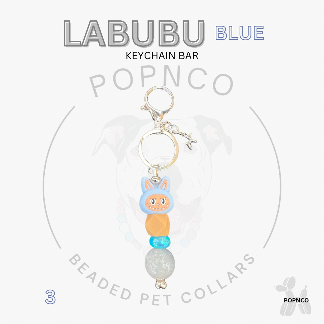 Labubu Blue keychain bar with a cartoon character charm on a white background
