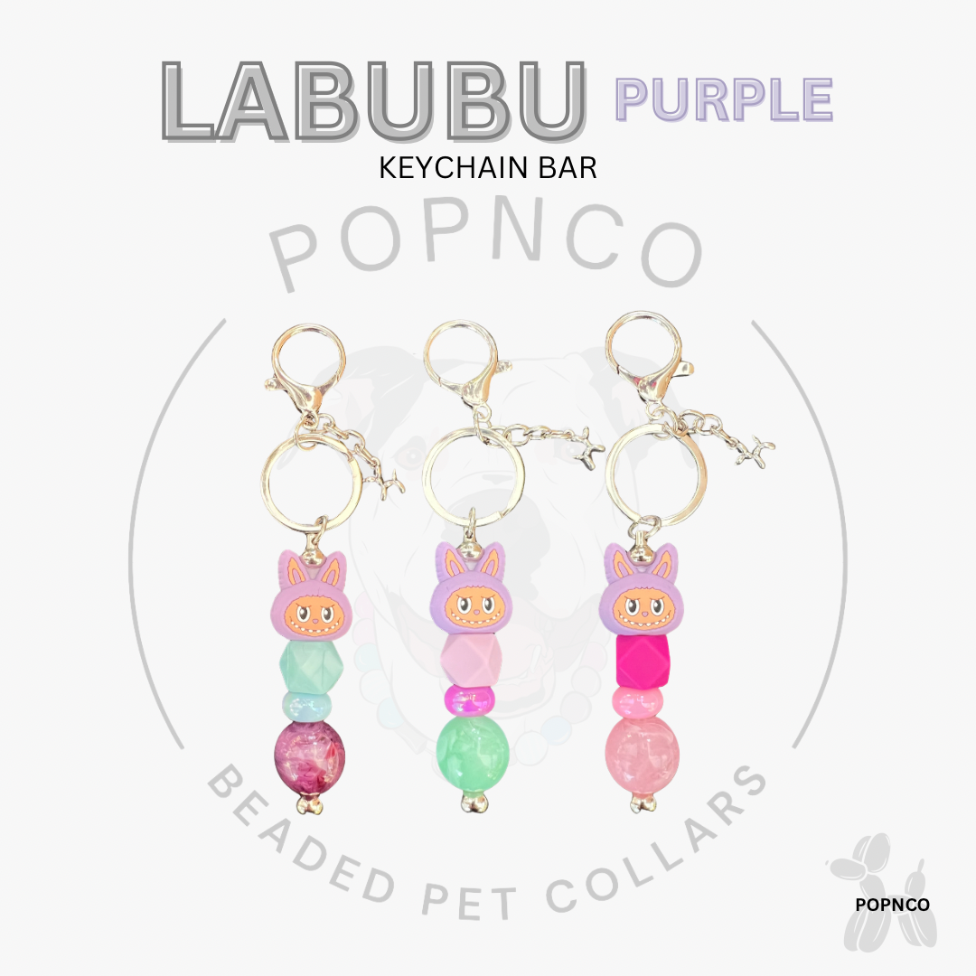 Three colorful beaded keychain bars with cartoon characters on a white background, featuring the brand 'LABUBU' and 'POPNCO'.
