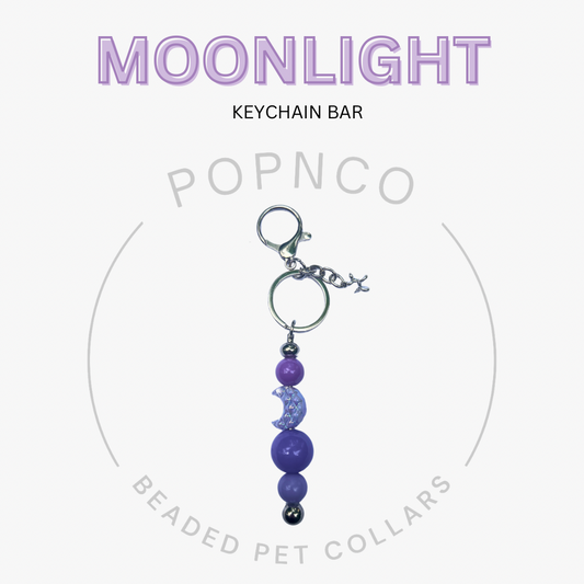 Purple beaded keychain bar with 'Popnco' branding on a white background