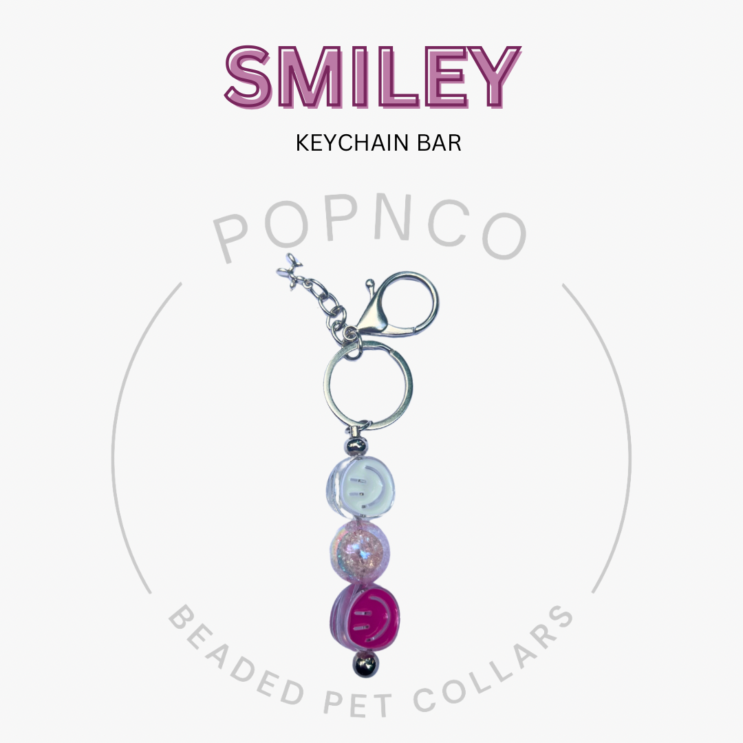 Keychain bar with colorful beads on a white background, featuring the brand 'Popnco'.