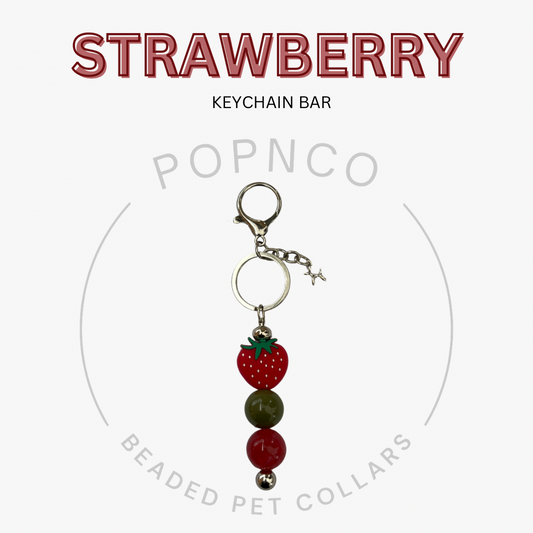 Strawberry keychain bar with 'Popnco' branding on a white background