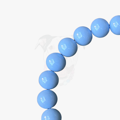 Blue beaded bracelet on a white background