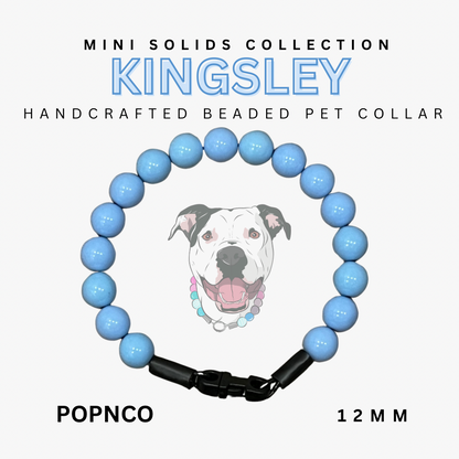 Handcrafted beaded pet collar with blue beads and black clasp, featuring a dog illustration on a white background.