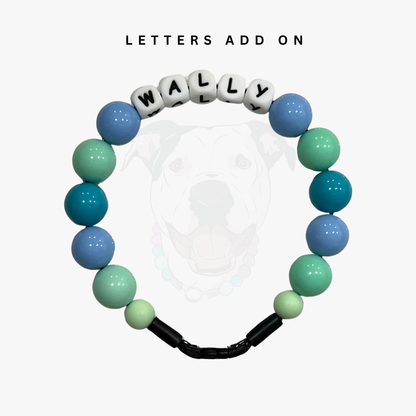 Bracelet with colorful beads and customizable letters on a white background POPNCO beaded collar, Beaded dog collar, blue dog collar, Breathable dog collar, cat collar, Collar for sensitive skin dogs, Comfortable Dog Collar, dog collar, Durable dog collar, Easy to clean dog collar, fashion collar, handmade, Pet accessories, pet collar, Popnco dog collar, slip on collar, Slip on dog collar, Stylish dog collar