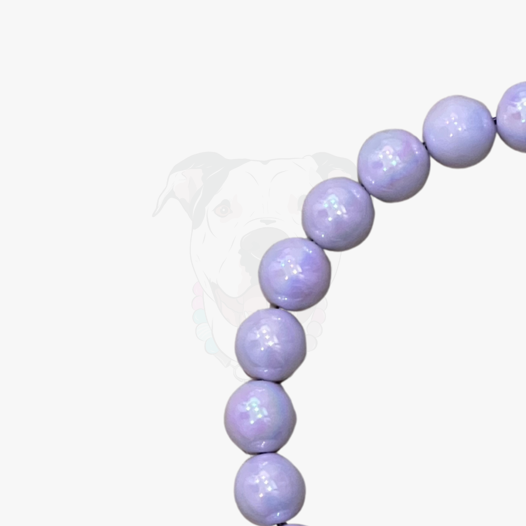 Purple beaded bracelet on a white background