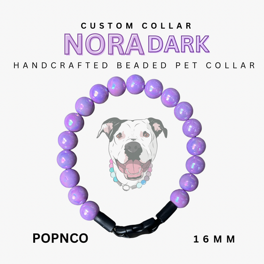 Handcrafted beaded pet collar with purple beads and a black clasp, featuring a dog's face illustration on a white background.