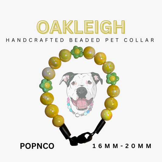 Handcrafted beaded pet collar with a dog illustration on a white background, featuring the brand 'Oakleigh'. POPNCO