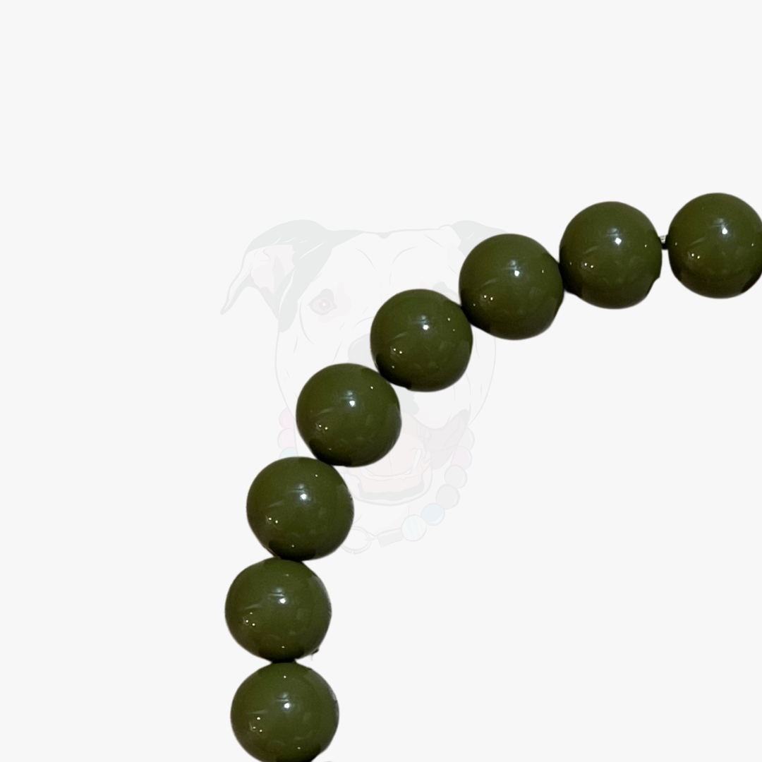 Green beaded bracelet on a white background
