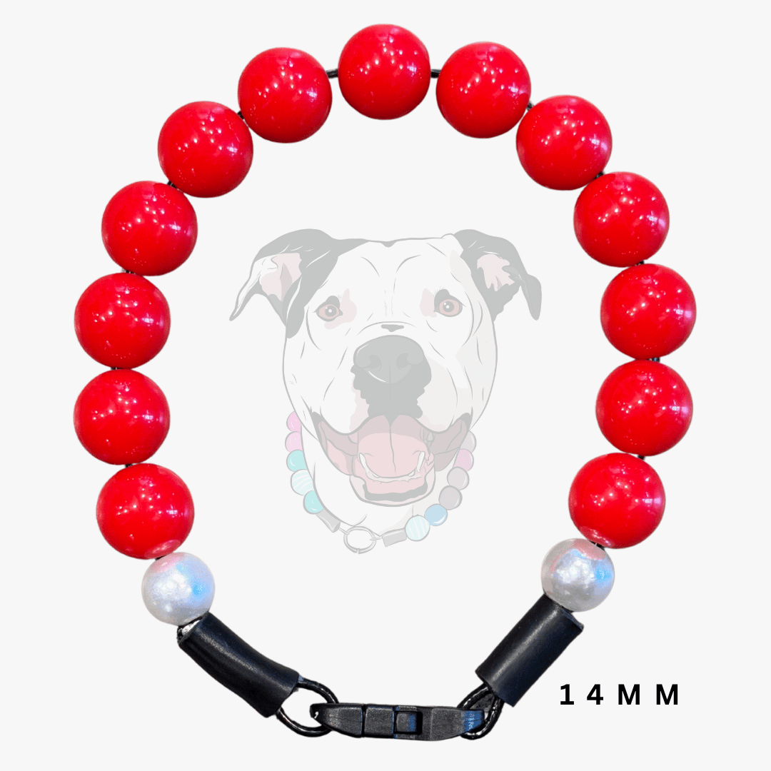 A red beaded pet collar with a black clasp and two iridescent white beads, shown against a light gray background with a faint dog graphic and '14 MM' text.