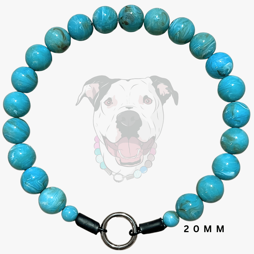 A beaded dog collar made of turquoise-blue marbled beads with a silver metal ring clasp and black end caps, shown on a light gray background with a faint dog illustration and the text '20MM'.