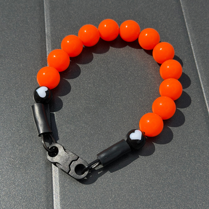 POPNCO 12mm Hunter Solid Orange beaded dog collar with a black clasp on a grey background 