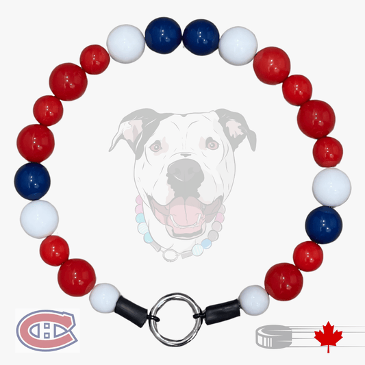 A beaded dog collar featuring red, white, and navy blue round beads, a silver metal ring clasp, and a black end cap. A faint dog graphic is in the background, with a Montreal Canadiens logo and a Canadian maple leaf magnet shown at the bottom.