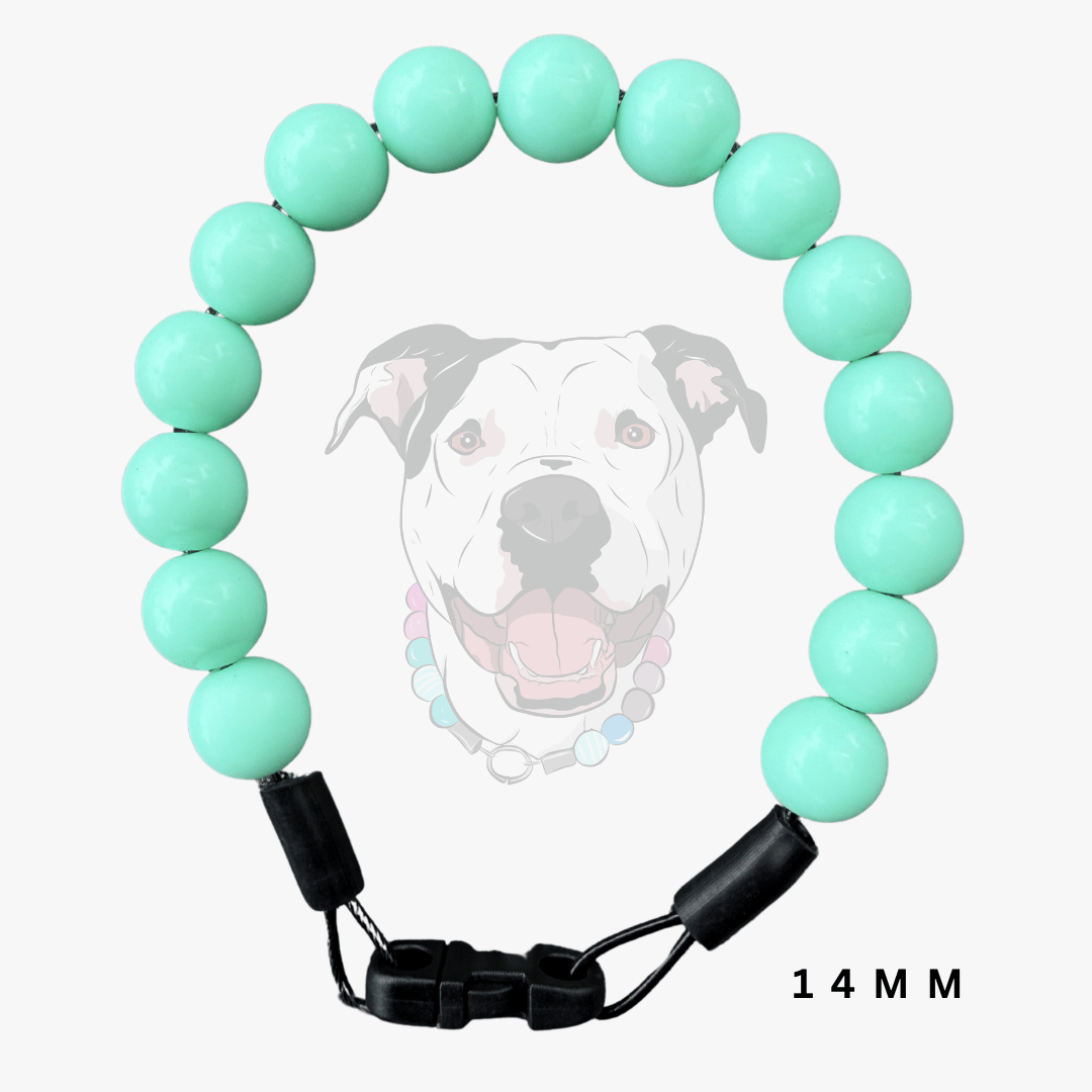 A dog beaded collar featuring 14mm mint green round beads and a black adjustable plastic buckle, shown against a light gray background with a faint dog graphic and '14 MM' text overlay.