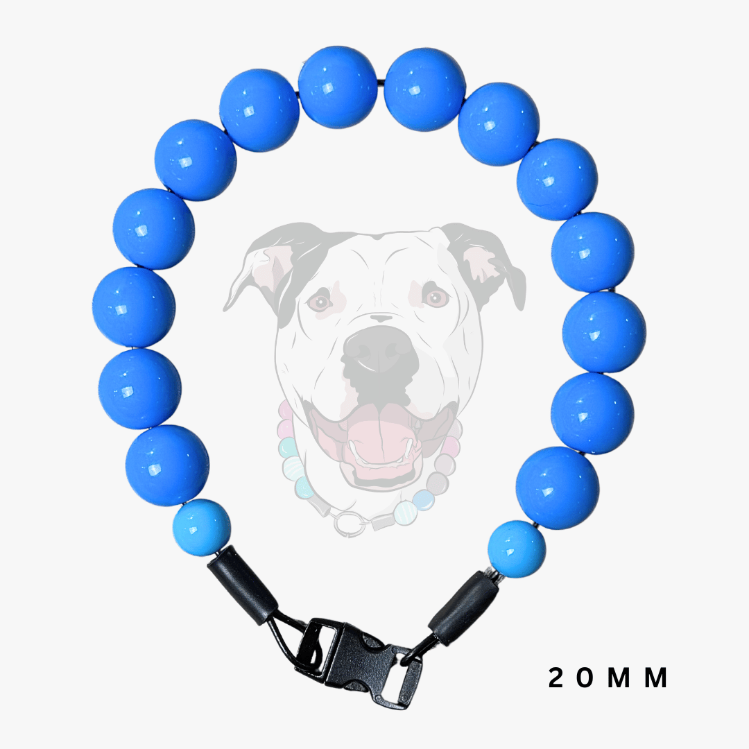 A beaded dog collar featuring glossy blue round beads and a black plastic buckle, displayed against a light gray background with a faint graphic of a dog's face and the text '20 MM'.