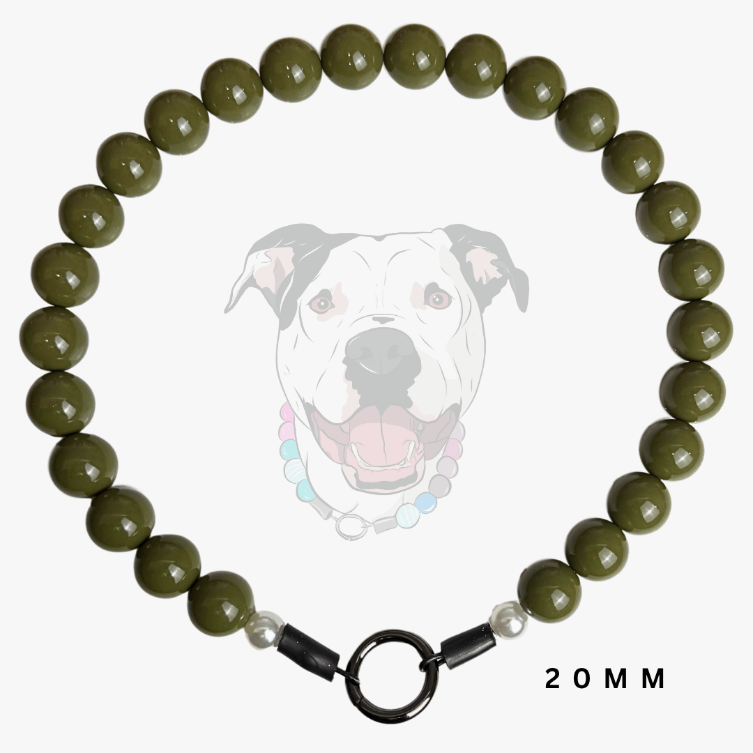 An olive green beaded dog collar with a black metal ring clasp and small white spacer beads, displayed against a white background with a faint dog graphic and '20MM' text.