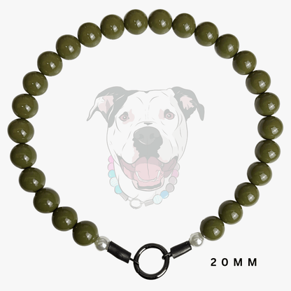 An olive green beaded dog collar with a black metal ring clasp and small white spacer beads, displayed against a white background with a faint dog graphic and '20MM' text.