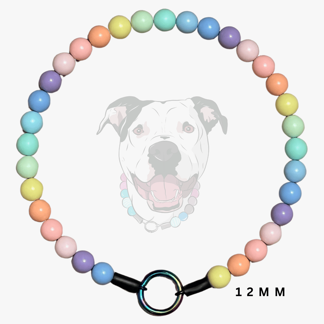 A pastel rainbow beaded dog collar with a black ring clasp and a black toggle, shown against a light gray background with a faint dog graphic and '12 MM' text.