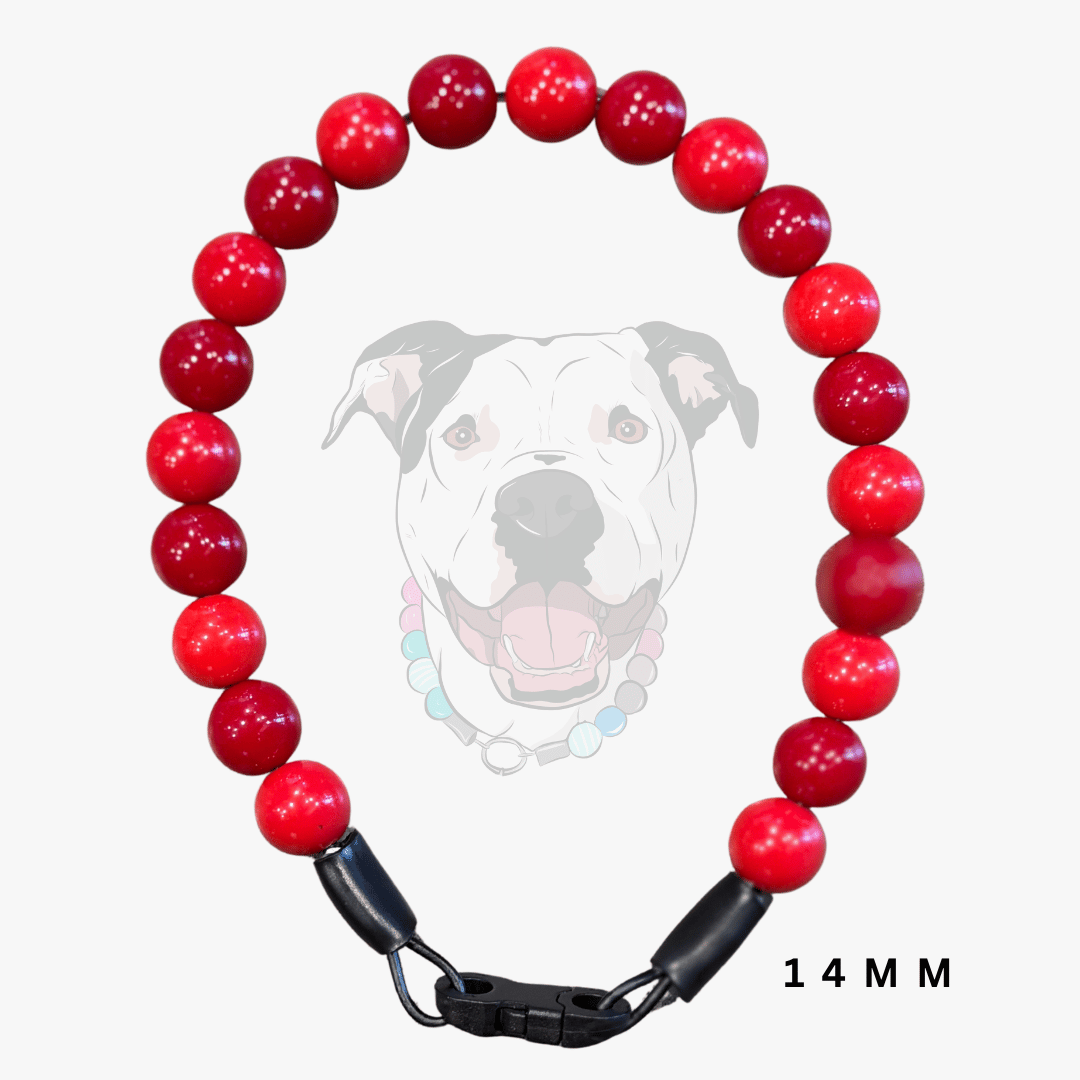 A red beaded dog collar with a black plastic clasp, shown against a light gray background with a faded graphic of a dog's face. The text '14 MM' is visible in the bottom right corner.