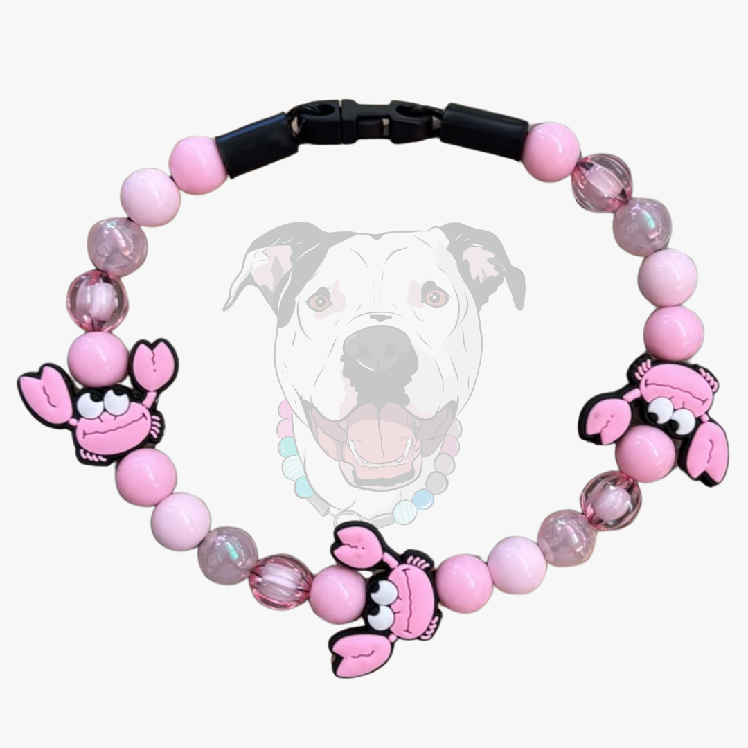 POPNCO Shelby Beaded Pet Collar featuring alternating pink acrylic beads mixed with pink crab silicone beads on aircraft grade stainless steel wire on a white background 
