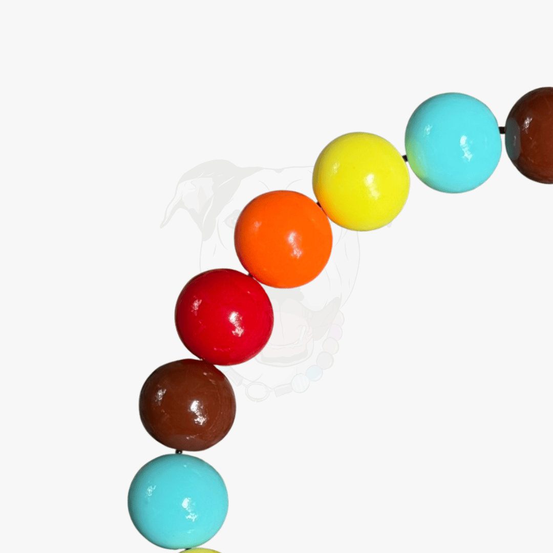 Close up of POPNCO Stephen Beaded Pet Collar 20mm Beads Clos up on a White Background showing Blue, Yellow, Red, Orange and Brown acrylic beads 